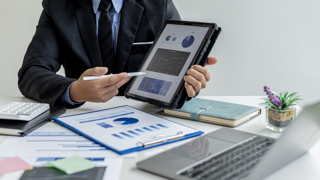 businessman showing sales data and pipeline