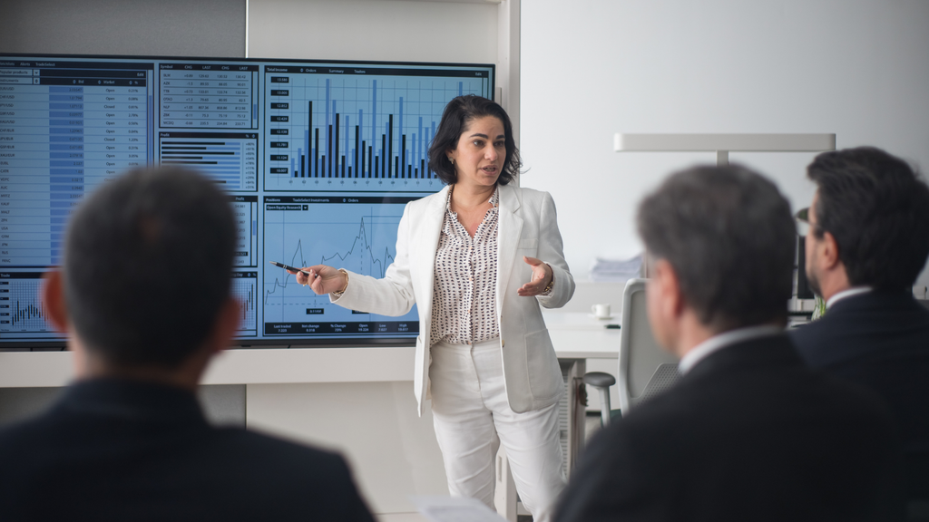 sales director reviewing sales forecasting software dashboard